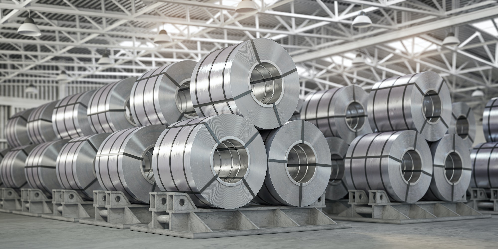 Rolls of metal sheet. Zinc, aluminium or steel sheet rolls on warehouse in factory.